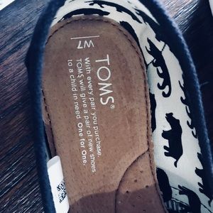 Toms black size 7, woman’s BRAND NEW
